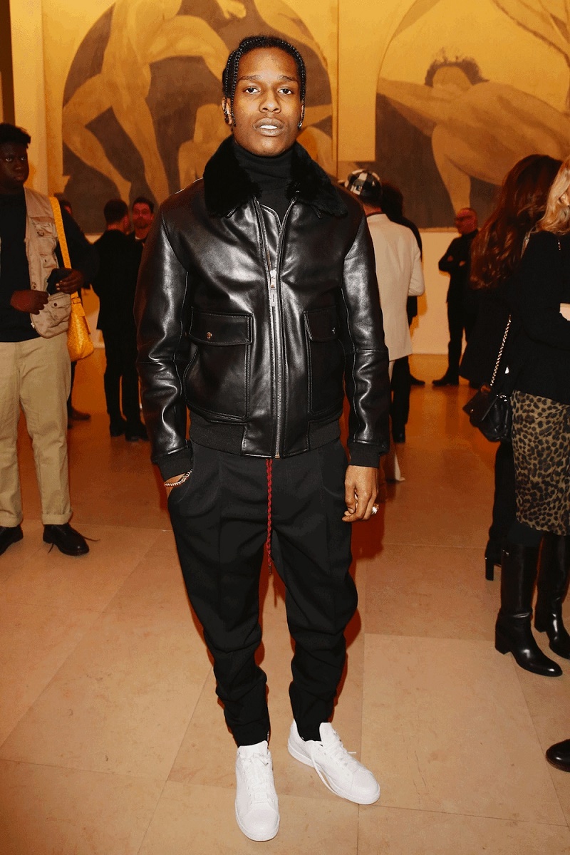 Lewis Hamilton Wears Louis Vuitton Souvenir Jacket and Sneakers at