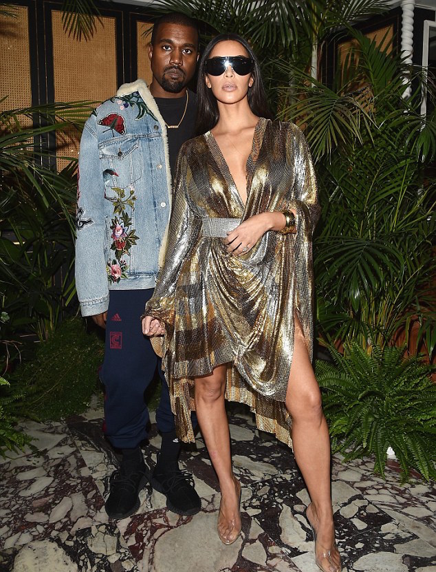 Kim Kardashian West and Kanye West in Adidas, Gucci, and Yeezy at