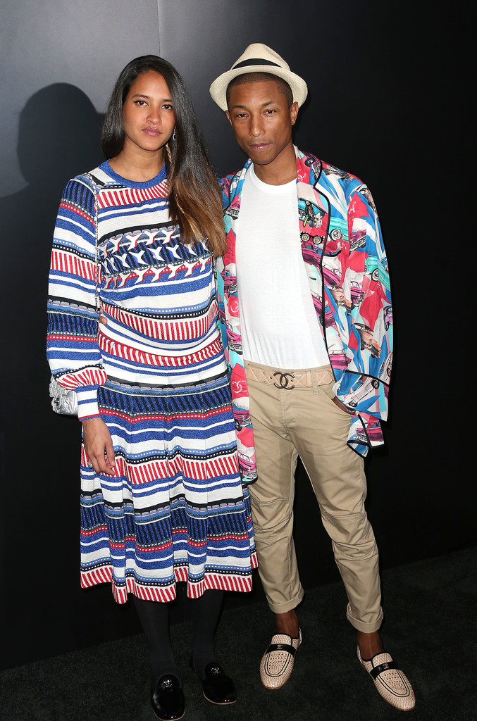 PHARRELL WILLIAMS, WIFE AND SON POSE IT UP DURING PFW 2023
