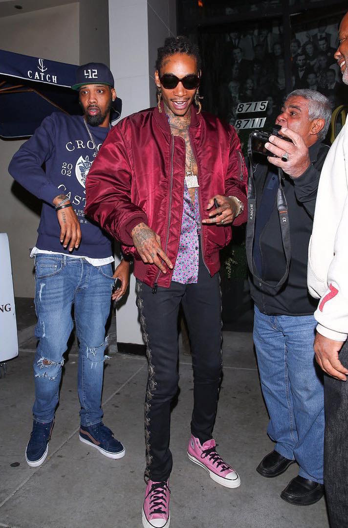 wiz-khalifa-alpha-industries-jacket-saint-laurent-jeans-converse-sneakers