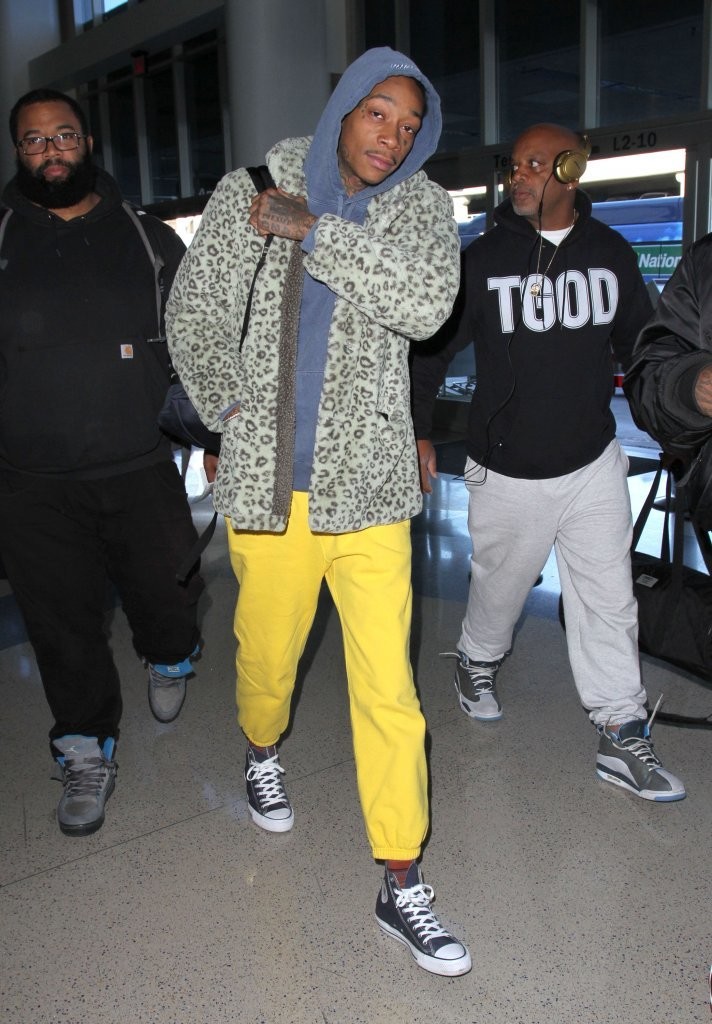 wiz-khalifa-gosha-rubchinskiy-coat-converse-sneakers-saint-laurent-backpack-2