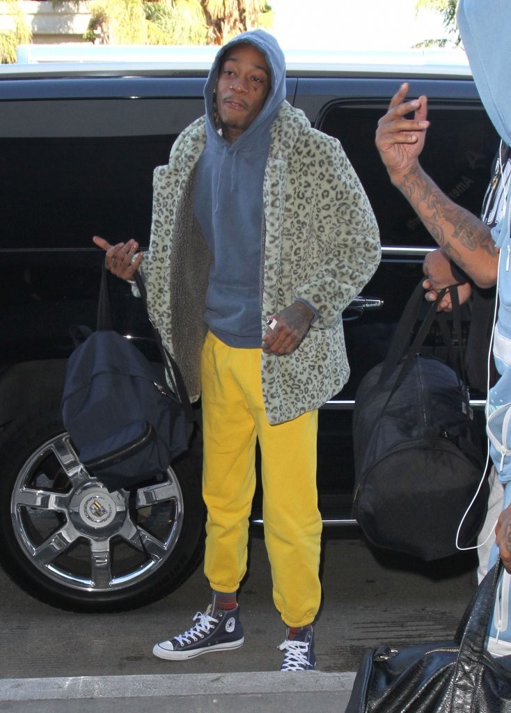 wiz-khalifa-gosha-rubchinskiy-coat-converse-sneakers-saint-laurent-backpack