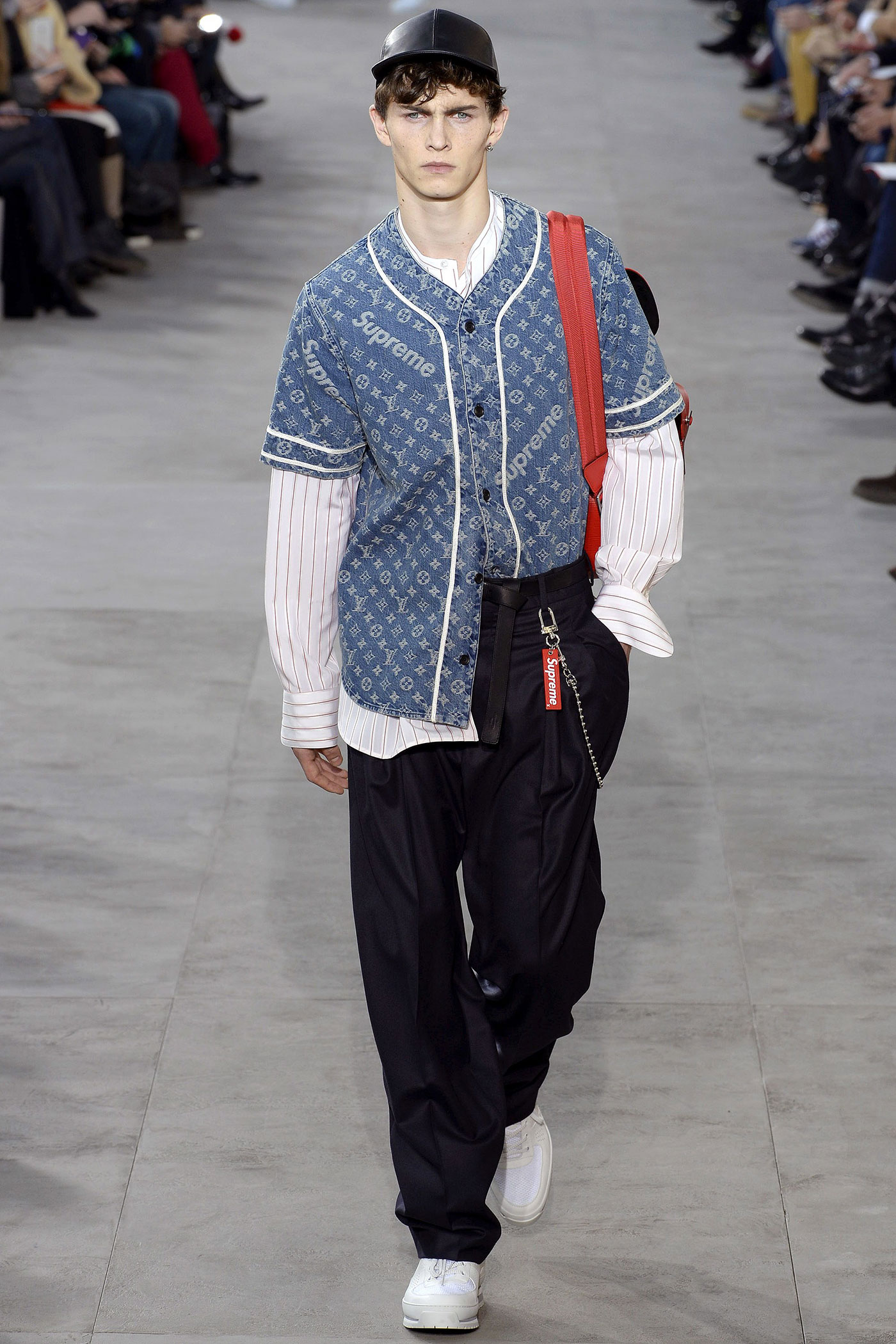 Travis Scott Wears Louis Vuitton x Supreme During Louis Vuitton