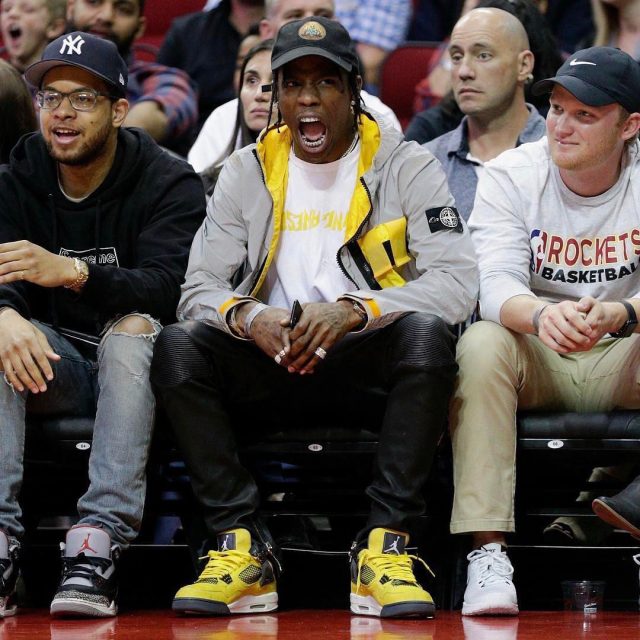 SPOTTED: Travis Scott Wears Stone Island Jacket, Balmain Pants and