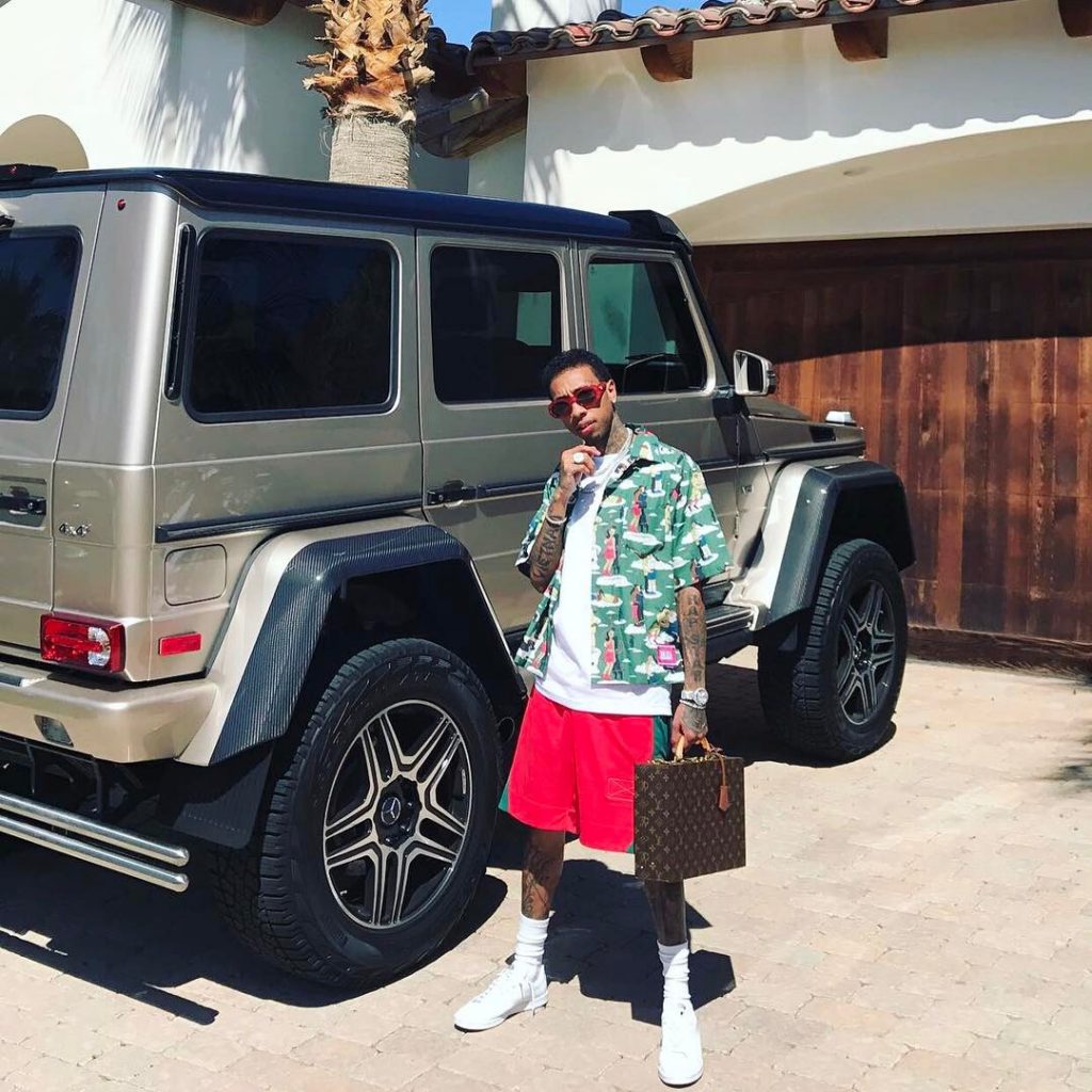 SPOTTED: Tyga In Prada Shirt, Martine Rose Shorts and Carrying Louis Vuitton  Briefcase for Coachella – PAUSE Online