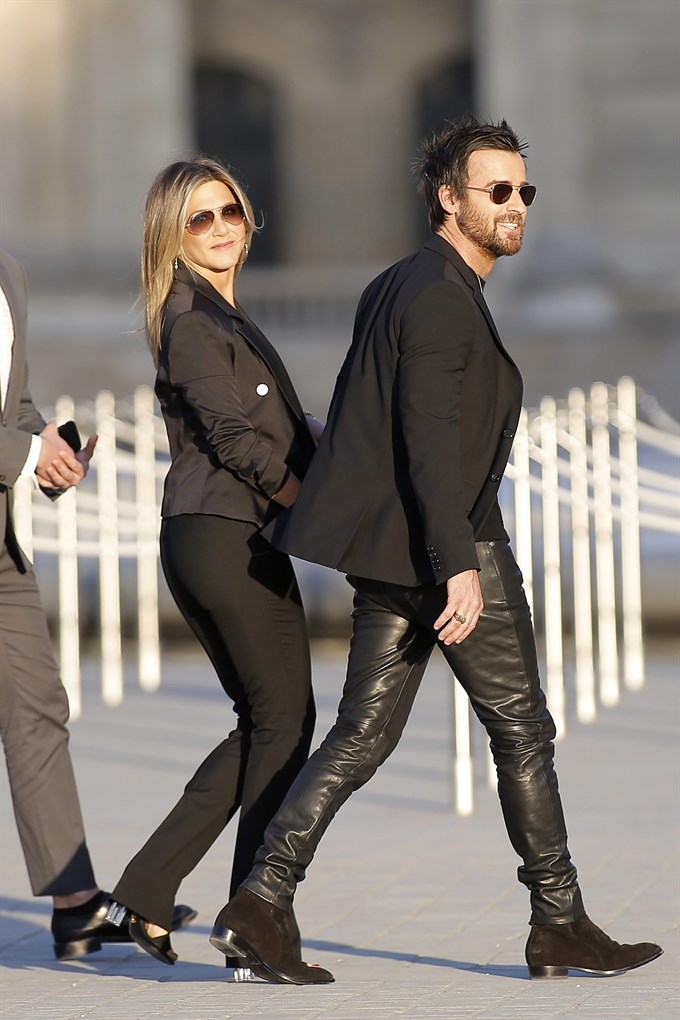 Justin Theroux and Jennifer Aniston attending the Louis Vuitton's