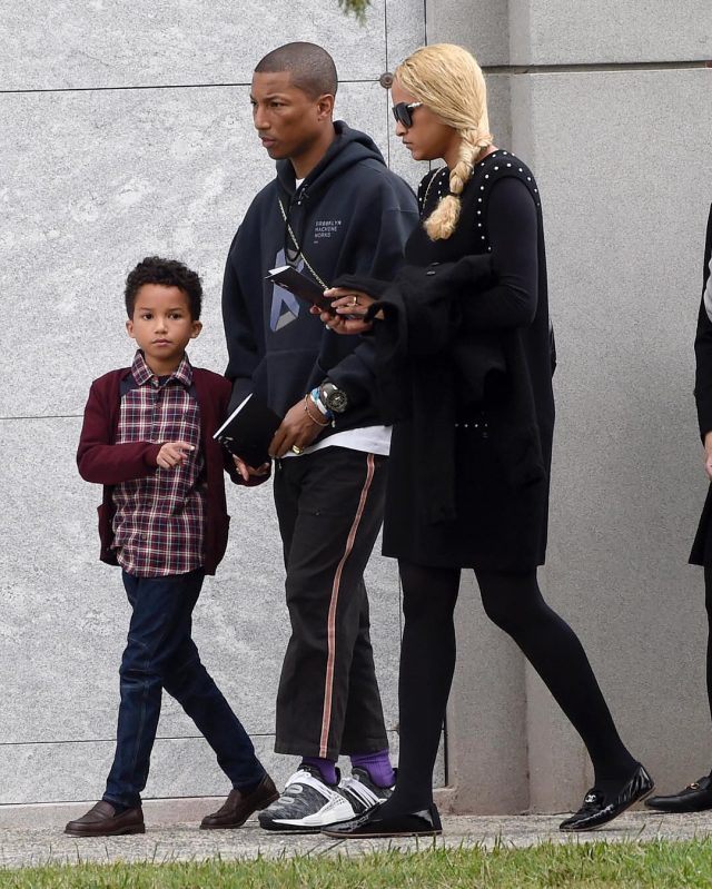 PHARRELL WILLIAMS, WIFE AND SON POSE IT UP DURING PFW 2023