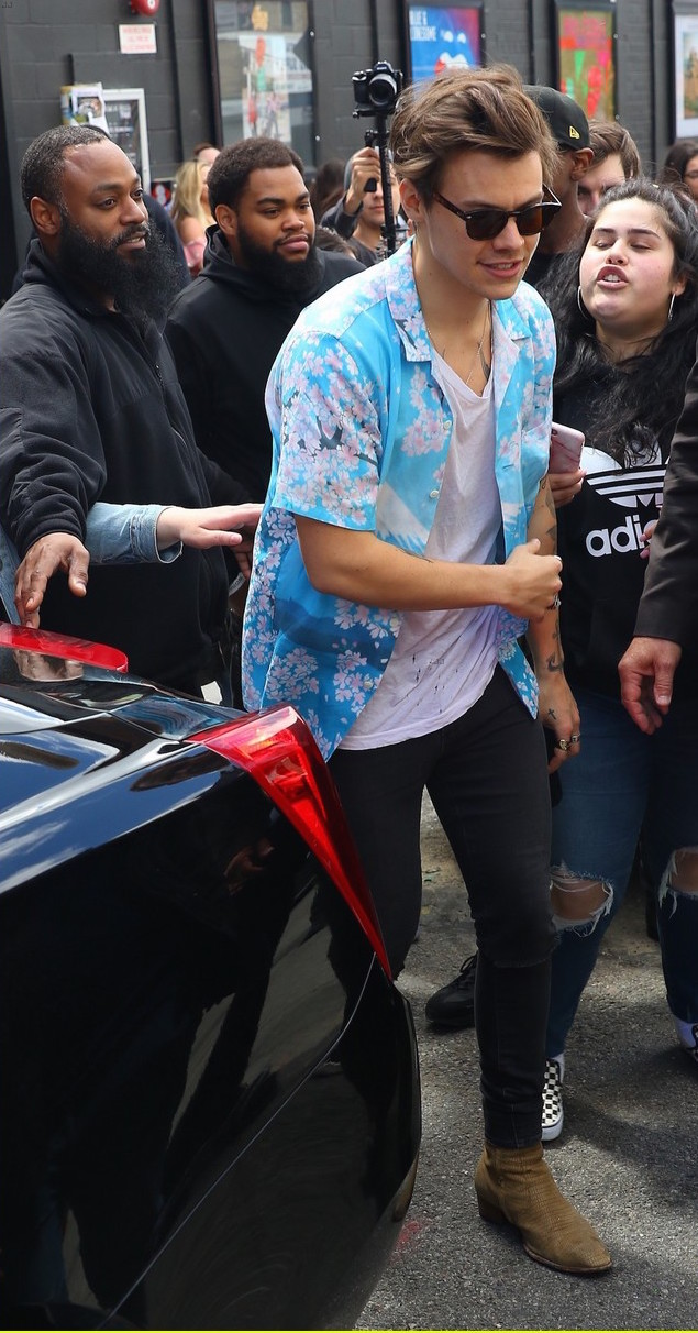 SPOTTED: Harry Styles Rocks Saint Laurent Boots & Blue Blue Japan