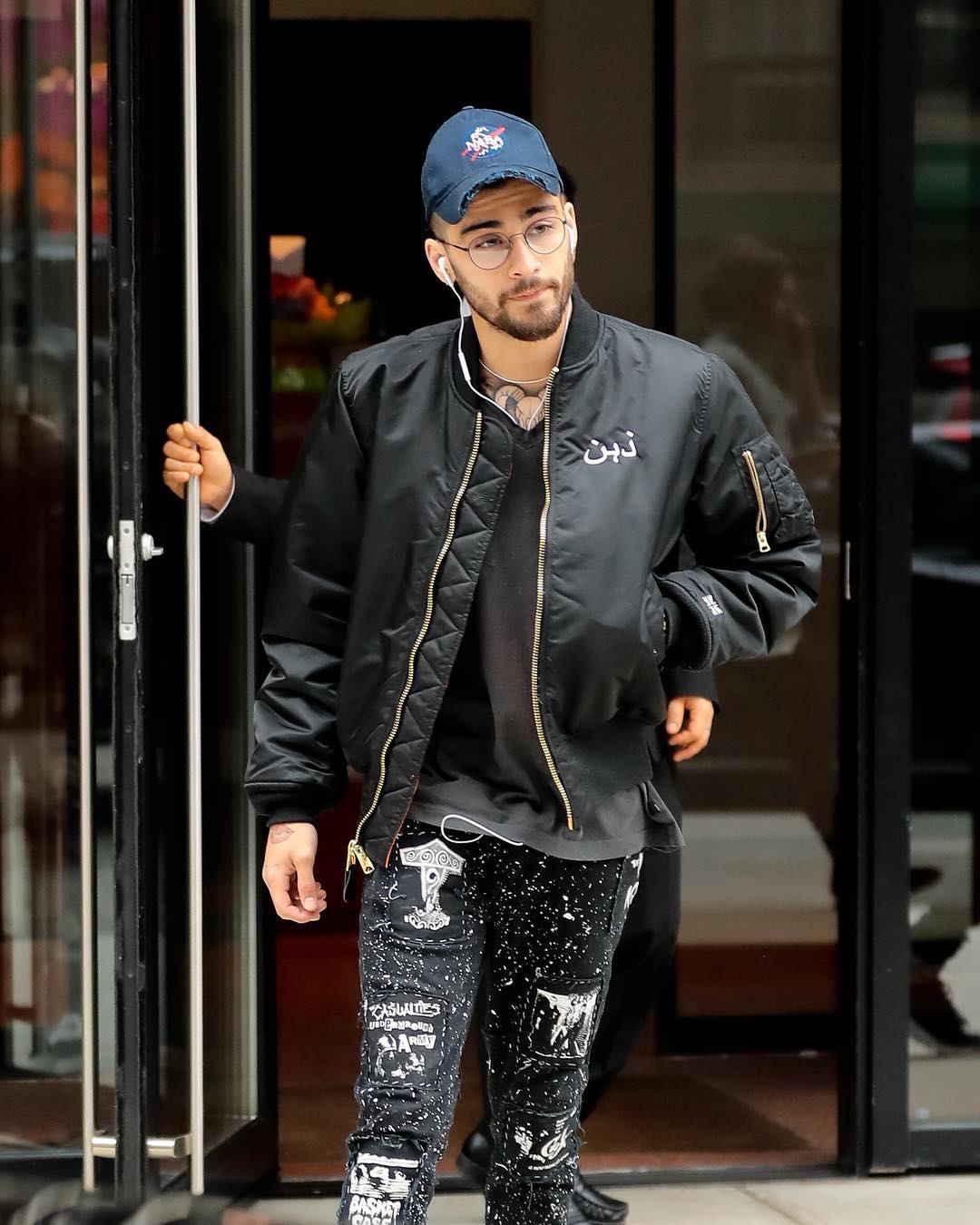 Spotted: Zayn Malik Wearing An Arabic Tour Merch Military Jacket ...