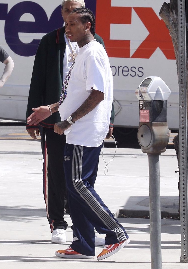 SPOTTED: Tyga In BAPE T-Shirt, Needles Track Pants And Custom Vans – PAUSE  Online